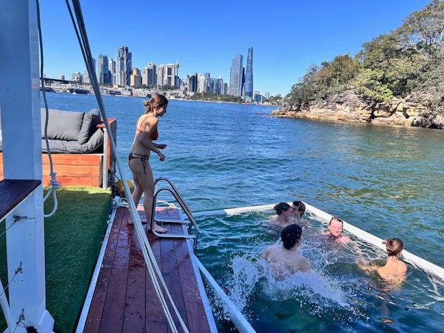 Guests enjoying a private wellness experience on Sydney Harbour
