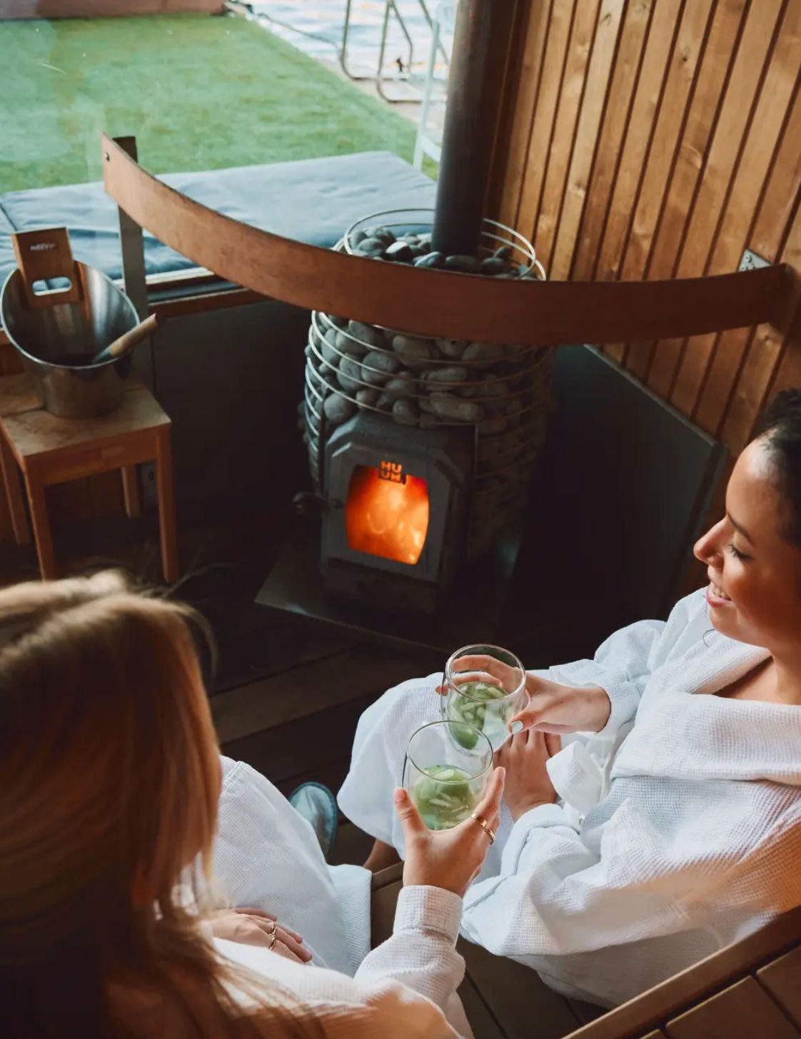 Couples relaxing in the wood fired sauna
